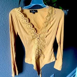 Lulu’s lace long sleeve body suit
